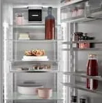 Height-adjustable inner door shelves
