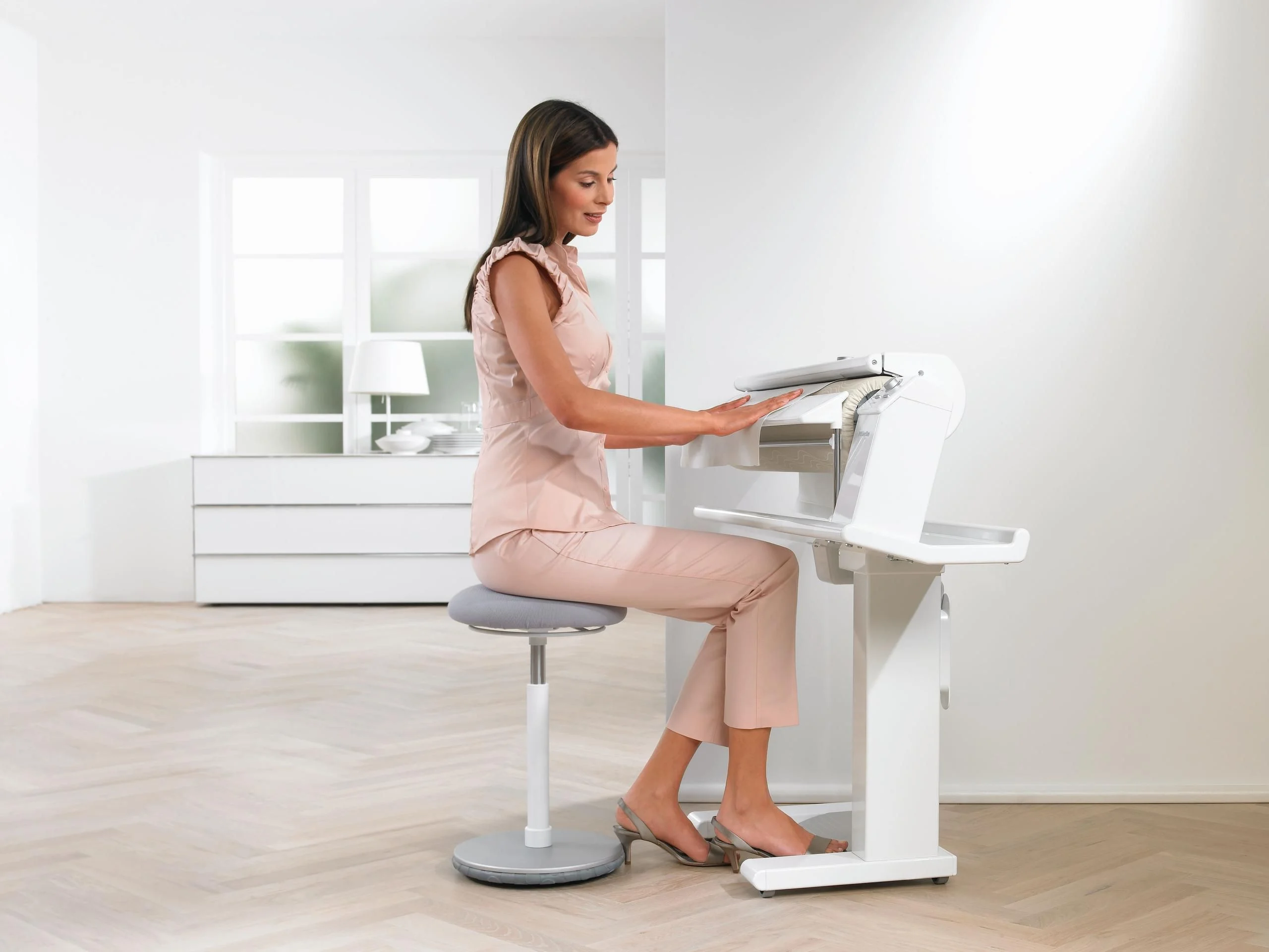 Ironing sitting down